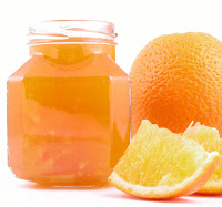 jar of orange jam isolated on white